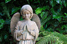 Praying angel statue