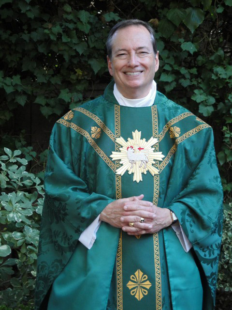 Man wearing a green robe