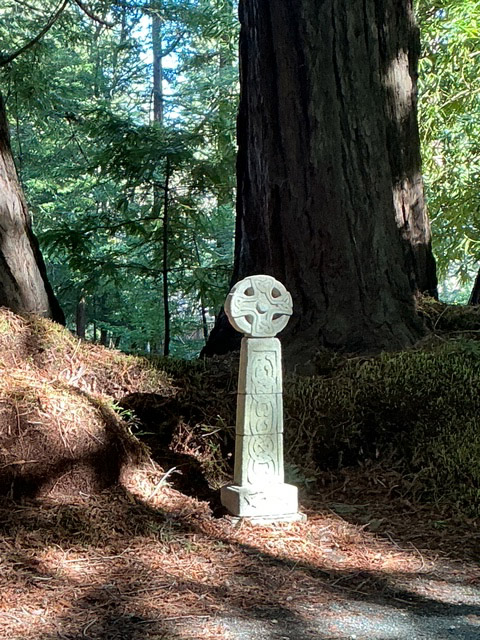 Cross monolith in the woods