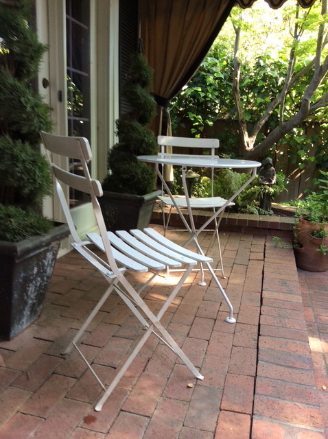 Cafe table and chairs on a patio